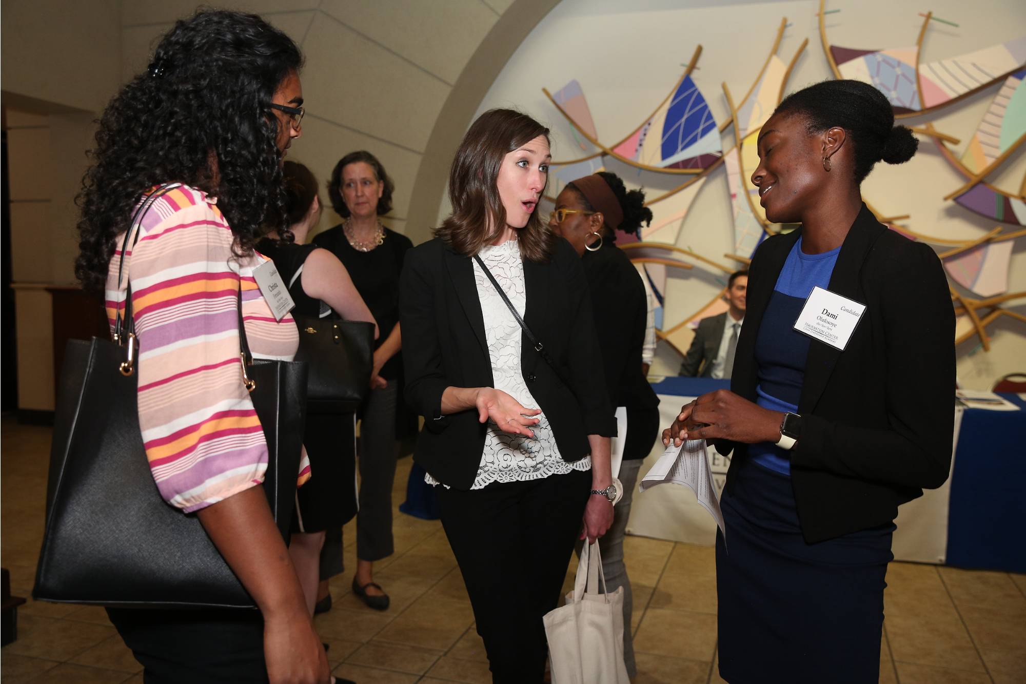 mentor talking to students